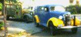 42k photo of 1937 Chevrolet 1,5-ton ambulance, 1940 Chevrolet Waynes bus on the back