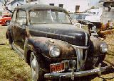 21k photo of 1941 Ford DeLuxe Tudor (2-door) Sedan