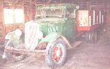 20k photo of 1935 International C30 grain truck with hoist