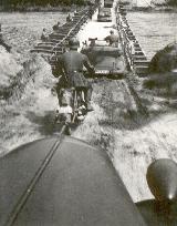 108k 1940 photo of Opel 2,0 Ltr. mascot, Maas river