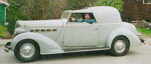 1936 Packard 120B sedanca de ville by Hibbard