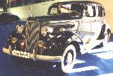 25k photo of 1937 Packard 120 4-door sedan