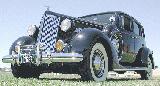 35k photo of 1937 Packard 120C 4-door touring sedan