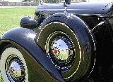 49k photo of 1937 Packard 120C 4-door touring sedan, spare