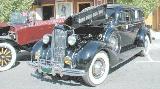 30k photo of 1937 Packard 120C 4-door touring sedan